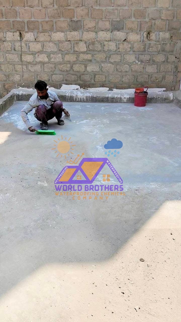 Worker applying low canvas elastomeric waterproofing coating on a Karachi roof